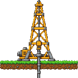 A drilling rig standing on the grass, its pipe going down into the ground